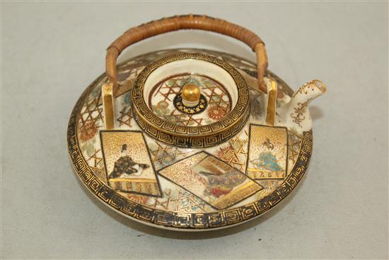 A Japanese Satsuma pottery tea or wine pot, 11.5cm. diam., rim chips